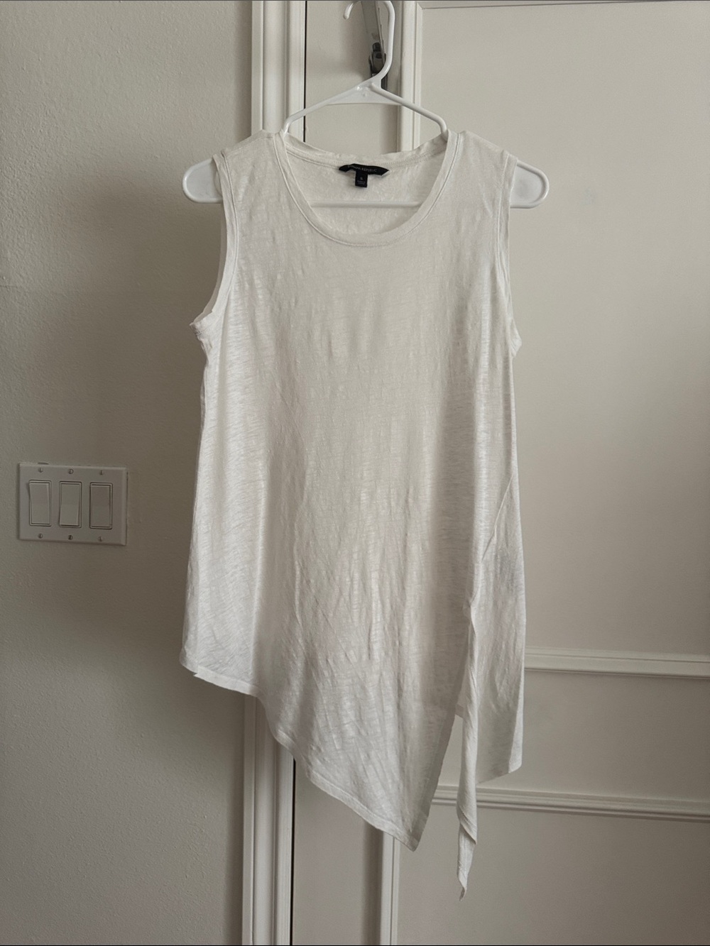Banana Republic Sleeveless Top with asymmetrical bottom and slit on the side